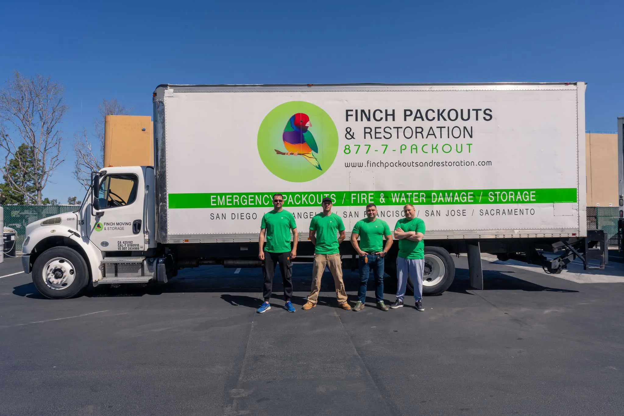 Finch crew in front of a service van